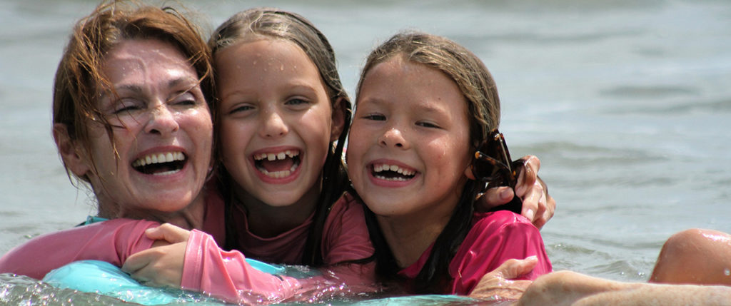 Lynn Land enjoys time in the water with her granddaughters