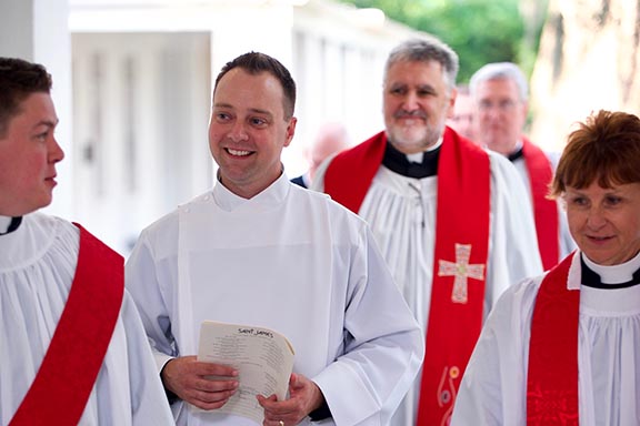 The Rev. Jeremy Shelton processes prior to his ordination.