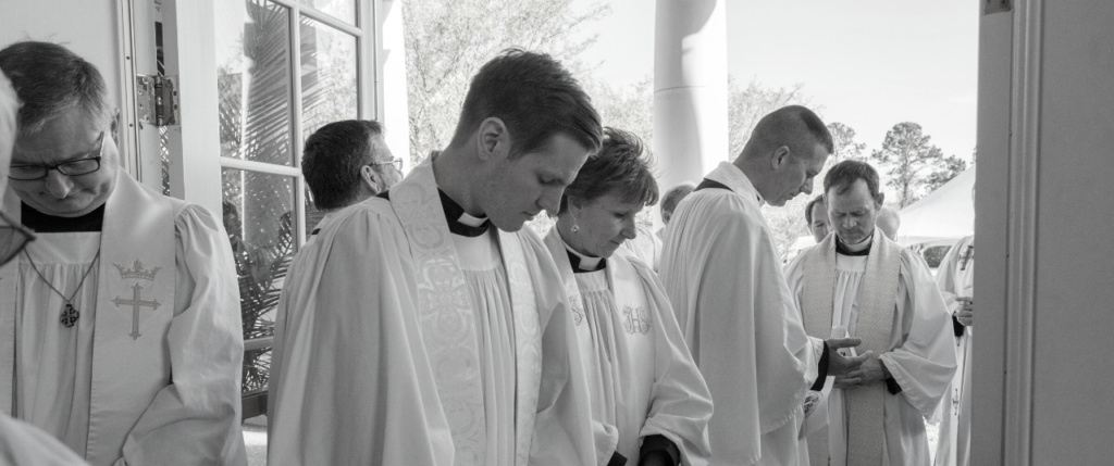 Clergy praying