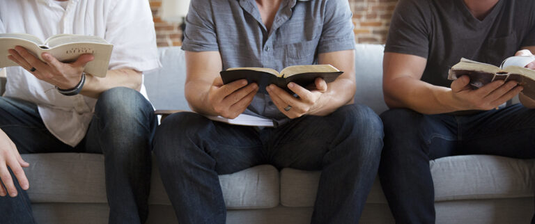Men reading Bibles